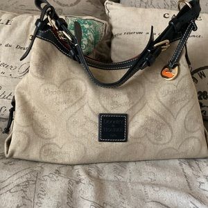 Dooney & Burke 1975 Tan Canvas Slouch type purse
